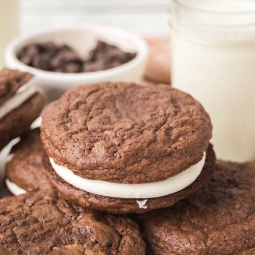 Close-up of a brownie cream pie with soft chocolate cookies and creamy filling.