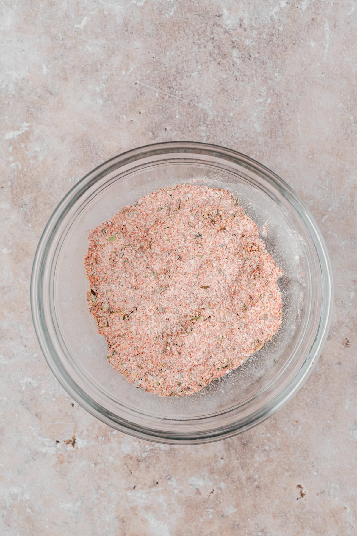 Homemade Cajun seasoning blended together in a bowl ready for wings.
